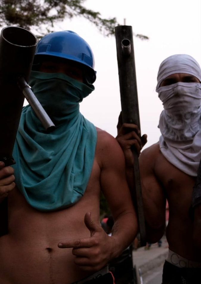 мирные оппозиционеры Венесуэлы