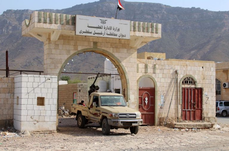 A military vehicle beloging to Yemen's southern separatist forces blocks the entrance at a local administration building on the strategic island of Socotra, on June 22, 2020. - The fall of Socotra on June 21 deepens the crisis between the separatist Southern Transitional Council (STC) and the government after the failure of a power-sharing deal in areas beyond the control of Huthi rebels, who hold the capital Sanaa and much of northern Yemen. The STC, which declared autonomy in southern Yemen on April 26, said it had already begun implementing self-rule on the island. (Photo by - / AFP) (Photo by -/AFP via Getty Images)