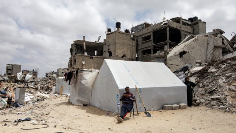 epa11314731 A Palestinian family places their tent next to their destroyed home in Khan Yunis after the Israeli army withdrew its forces from the southern Gaza Strip, 02 May 2024. More than 34,550 Palestinians and over 1,455 Israelis have been killed, according to the Palestinian Health Ministry and the Israel Defense Forces (IDF), since Hamas militants launched an attack against Israel from the Gaza Strip on 07 October 2023, and the Israeli operations in Gaza and the West Bank which followed it. EPA/HAITHAM IMAD