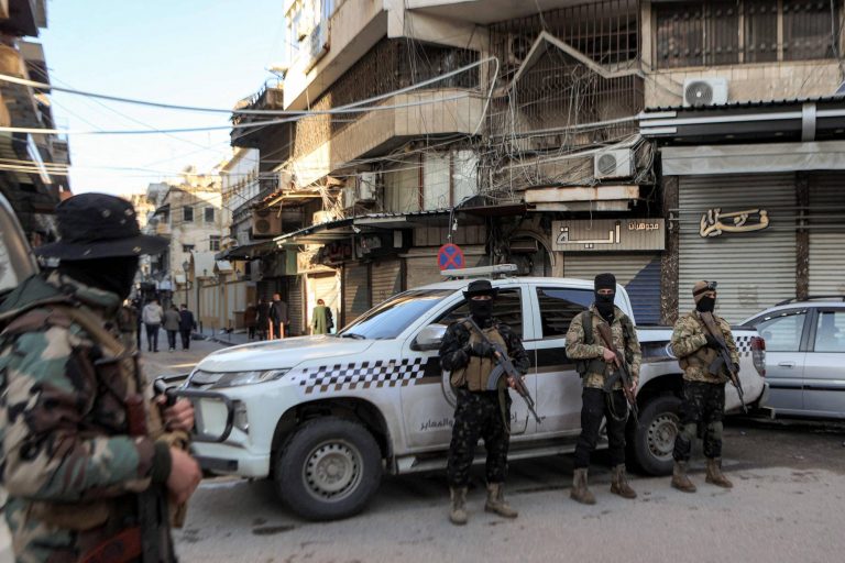 Security forces deploy outside the Greek Orthodox Cathedral of St George during the Christmas morning mass in Syria's western coastal city of Latakia on December 25, 2024. (Photo by AAREF WATAD / AFP)