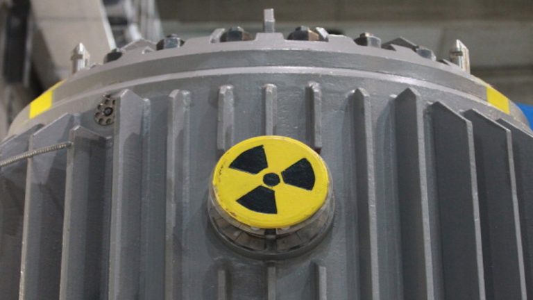 LUBMIN, GERMANY - JUNE 08:  A symbol for radioactivity is visible on a radioactively-contaminated container once used to transport nuclear fuel rods at the nearby Greifswald former nuclear power plant at the Zwischenlager Nord temporary nuclear waste storage facility on June 8, 2011 in Lubmin, Germany. The Zwischenlager Nord, run by Energiewerke Nord GmbH, contains low, medium and high radioactive waste as well as spent nuclear fuel rods from both west and east German nuclear power plants and research reactors. The German government has stepped up its efforts to create a permanent nuclear storage site, and the former mines at Schacht Konrad and Gorleben are under consideration, though both remain controversial. The government recently announced it will phase out nuclear energy in Germany completely by 2022.  (Photo by Sean Gallup/Getty Images)